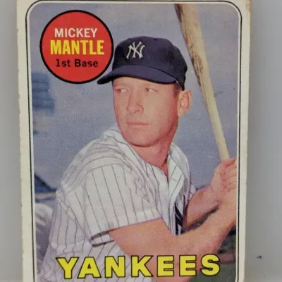 Sale Photo Thumbnail #40: 1968 Topps Mickey Mantle #280 baseball card featuring the New York Yankees legend in his 1st Base position, showing light corner wear and soft edges.