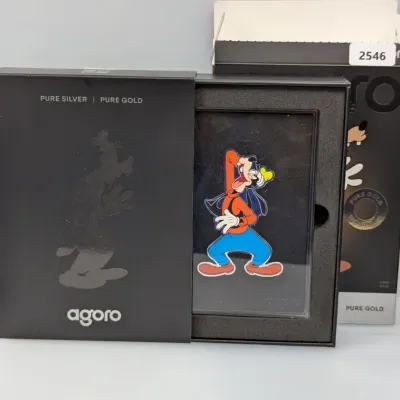 Sale Photo Thumbnail #871: Agoro Disney Goofy pure gold collectible card in original foam-lined display box and outer packaging.