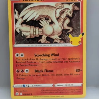 Sale Photo Thumbnail #491: 2021 Pokémon Celebrations Reshiram trading card, number 002/025, illustrated by Aya Kusube.