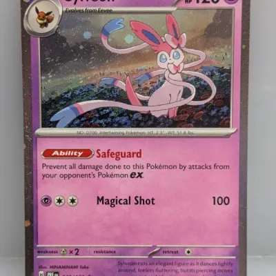 Sale Photo Thumbnail #565: Pokémon Trading Card Game Sylveon promo card (#040/131) featuring holographic artwork.