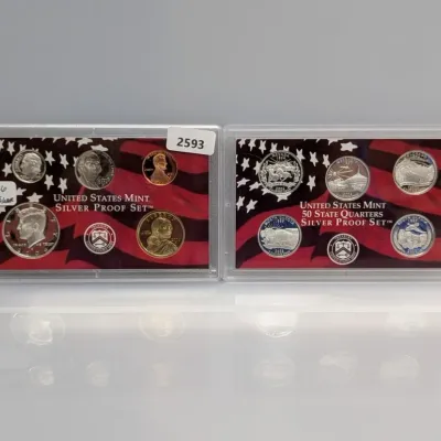 Sale Photo Thumbnail #918: 2006 United States Mint Silver Proof Set including standard coinage and 50 State Quarters in original protective cases.