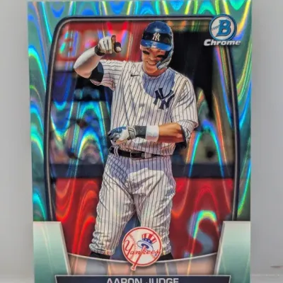 Sale Photo Thumbnail #449: Bowman Chrome Aaron Judge baseball trading card featuring a vibrant holographic refractor design.