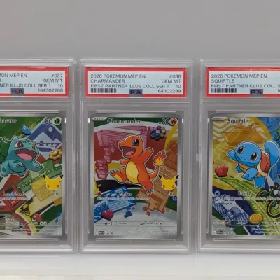 Sale Photo Thumbnail #82: Trio of PSA Gem Mint 10 graded 2026 Pokémon First Partner Illustration Collection cards, featuring Bulbasaur, Charmander, and Squirtle.