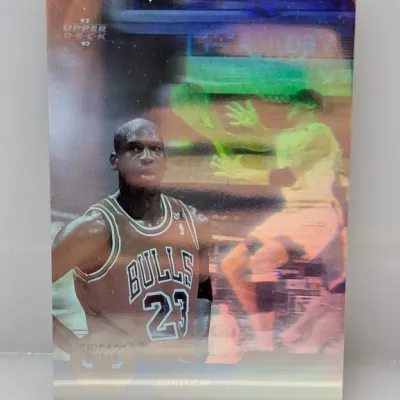Sale Photo Thumbnail #378: 1992-93 Upper Deck Michael Jordan hologram basketball trading card featuring the Chicago Bulls guard in his #23 jersey.