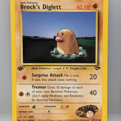 Sale Photo Thumbnail #362: 1st Edition Brock's Diglett Pokémon trading card from the Gym Heroes set, released by Wizards of the Coast in 2000.