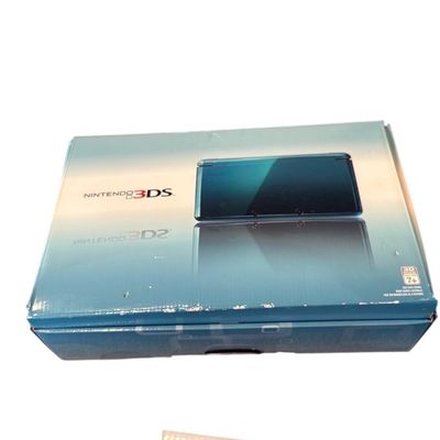 Sale Photo Thumbnail #28: Boxed Nintendo 3DS console in Aqua Blue alongside an boxed Nintendo 3DS Mario Kart 7 Wheel accessory.