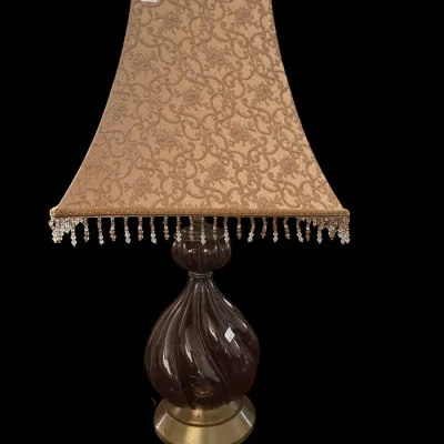 Sale Photo Thumbnail #379: Table lamp with dark glass base  brass foot  and patterned fabric shade with bead fringe. Local   in   / Shreveport area. Items may be held with pre-payment or a deposit. We are not scammers  you can check our track record  and we are verified. We can acc