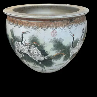 Sale Photo Thumbnail #384: Traditional Chinese porcelain jardiniere/fishbowl planter hand-painted with red-crowned cranes amidst pine trees  red chop mark seal  and decorative ornamental border trim.  