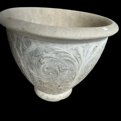 Sale Photo Thumbnail #380: Heavy cast stone concrete garden planter featuring an embossed horizontal swag of clustered grapes and grape leaves around the body with a rolled lip rim. Aged natural distressed finish. Perfect for patio or porch staging.