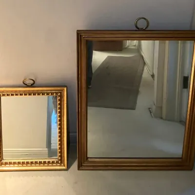 Two Gold-Framed Wall Mirrors