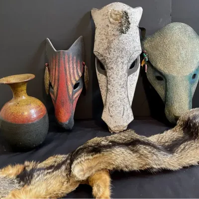 Hand-Sculpted Animal Masks with Fox Pelt