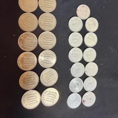 Japanese Coins 100 Yen And 1 Yen