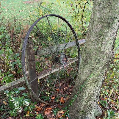Sale Photo Thumbnail #4: Vintage rusted iron wagon wheel 