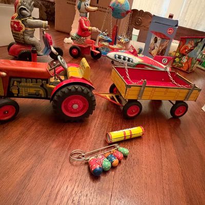 Sale Photo Thumbnail #22: Collection of vintage lithographed tin-litho wind-up toys