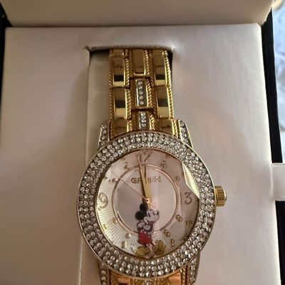 Sale Photo Thumbnail #2: Gruen gold-tone Mickey Mouse watch with rhinestone-encrusted bezel and bracelet, displayed in original presentation box.