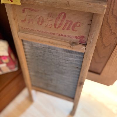 Sale Photo Thumbnail #51: Vintage Two in One washboard by the Carolina Washboard Co. featuring a wooden frame and corrugated metal rubbing surface.