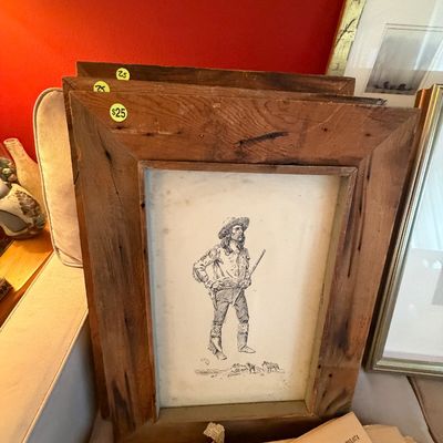 Sale Photo Thumbnail #83: Framed Western-style line illustration of a cowboy in a rustic rustic wood frame, stacked alongside similar artwork.