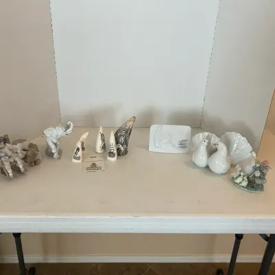 Scrimshaw And Lladro Ceramic Pieces