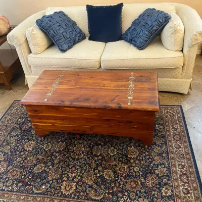 Sofa, Cedar Chest, And Area Rug