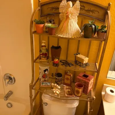 Shelf And All The Decor Pictures On It