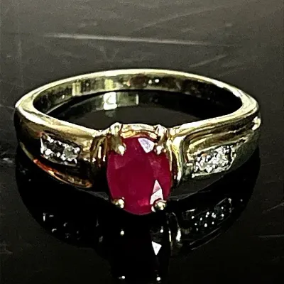 10K Yellow Gold Genuine Oval Ruby 4 Diamond Ring