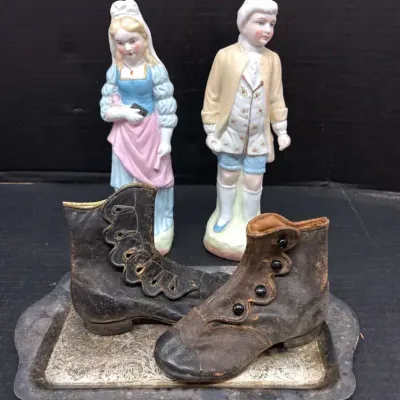 Antique Collectibles With Victorian Baby Shoes And Bisque Figurines 
