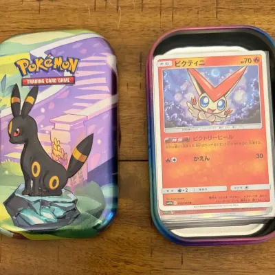 22 Holographic/Foil & 16 Basic Japanese Pokemon Cards In Collectible Tin