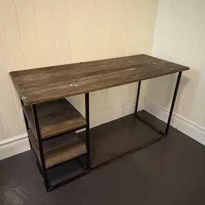 Sale Photo Thumbnail #125: Rustic industrial desk featuring a grey weathered wood-look surface, integrated side shelves, and a black metal frame.