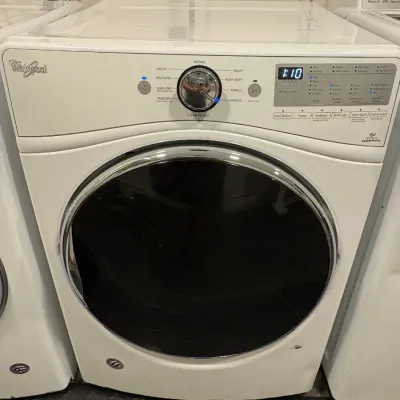 Sale Photo Thumbnail #139: Modern white Whirlpool front-load dryer featuring a digital display, chrome door trim, and steam refresh cycles.