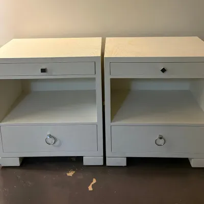 Sale Photo Thumbnail #130: Pair of contemporary white textured nightstands featuring a top drawer, central open compartment, and lower drawer with ring pull hardware.