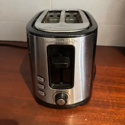 Hamilton Beach two-slice toaster in brushed stainless steel and black plastic casing.