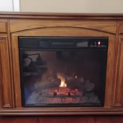 Twin Star Electric Fireplace with Oak Finish Wood Mantel 