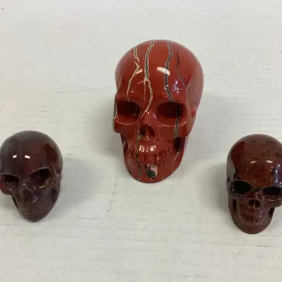 Trio Of Carved Stone Sculls