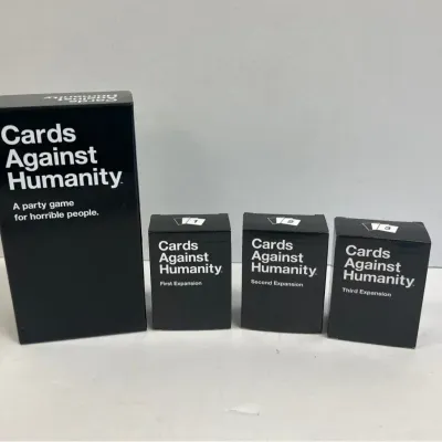 Cards Against Humanity And Expansion Packs (4)