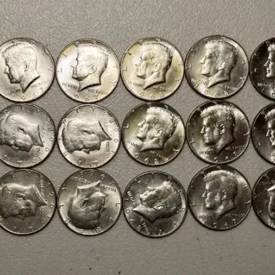 15 Kennedy half dollars 1965-70 40% silver 