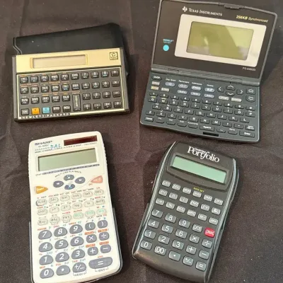 Vintage Calculators - Texas Instruments, HP, Sharp DAL & Conde Nast Portfolio (4pc)