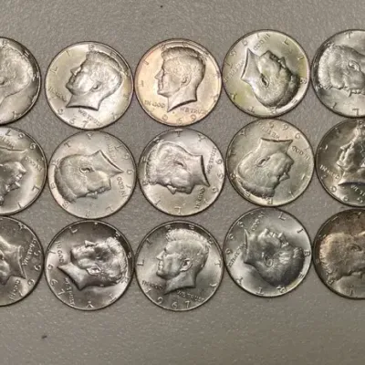 15 Kennedy half dollars 1965-70 40% silver 
