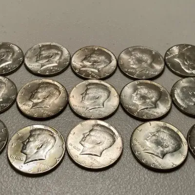 15 Kennedy half dollars 1965-70 40% silver 