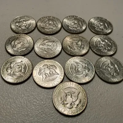 13 Kennedy half dollars 1965-70 40% silver 