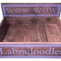 Rustic dark-stained wooden dog bed featuring purple trim with 'WOW WOW' on the headboard and 'Labradoodles' on the...