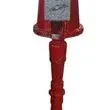 Vintage red metal gumball machine mounted on a matching floor stand, complete with a glass globe and coin-operated mechanism.