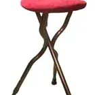 Portable folding cane chair featuring a dark metal three-legged frame with rubber feet and a red padded seat.