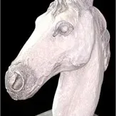 Sculpted plaster horse head bust mounted on a square pedestal base with a metallic silver-gray finish.