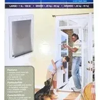 PetSafe large plastic pet door in its original retail box, suitable for pets up to 100 lbs.