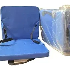 Pair of blue padded stadium seat cushions with adjustable support straps, one new in original plastic packaging.