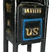 Vintage cast iron US Mail mailbox-style still bank featuring embossed gold lettering and blue accents.