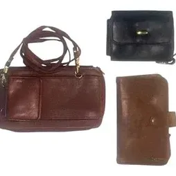Trio of leather accessories including a reddish-brown crossbody handbag, a tan snap wallet, and a small black coin purse.