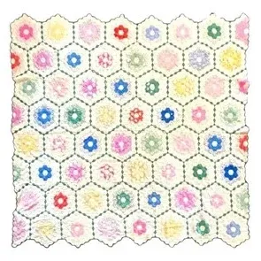 Handmade Grandmother's Flower Garden patchwork quilt featuring colorful hexagonal floral motifs framed in cream fabric with...
