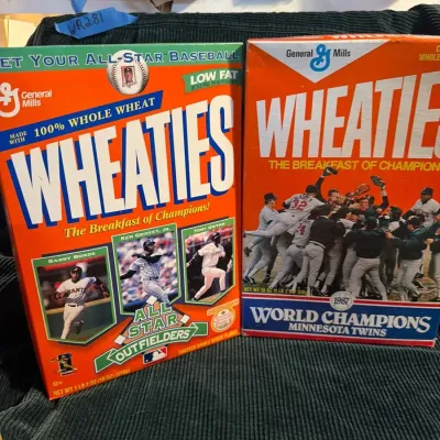 Pair of vintage Wheaties boxes featuring the 2003 NBA Champion San Antonio Spurs and Marcus Allen in