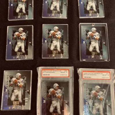 Nine 1998 Playoff Momentum Peyton Manning Rookie Cards…2 PSA